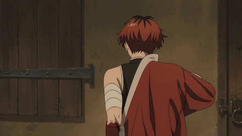 Red-Haired Man Standing at Door