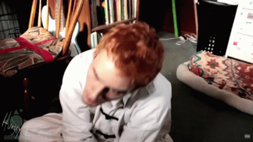 Red-Haired Person in White Shirt Saying Always