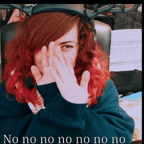 Red-Haired Woman Covering Face No No No