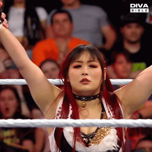 Red-Haired Woman in Diva Bible Wrestling Ring