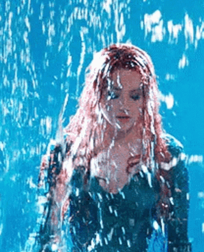 Red-Haired Woman In Pool GIF