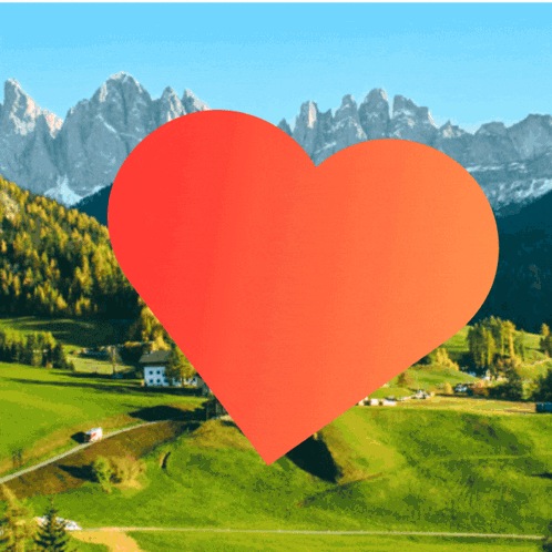 Red Heart in Front of Mountain Range