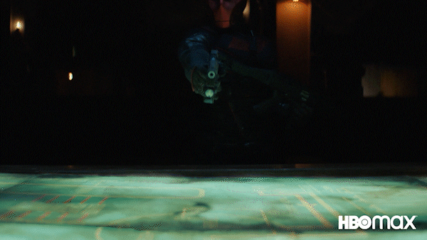 Red Hood Comic Character Peeking In Darkness GIF