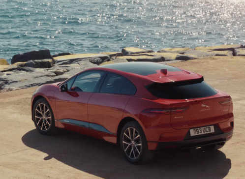 Red Jaguar I-Pace Near Ocean