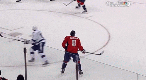 Red Jersey Hockey Player Number 2 Skating