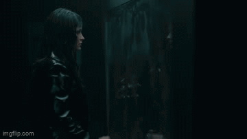 Red Lightning When Woman Touch Mirror GIF