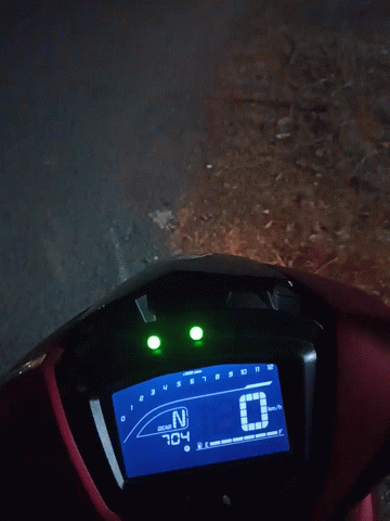 Red Motorcycle Digital Display Showing 1:25