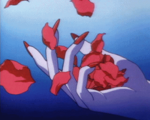 Red Petals On Hand Aesthetic GIF
