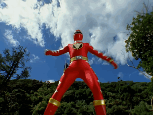 Red Power Ranger in Front of Blue Sky and Trees