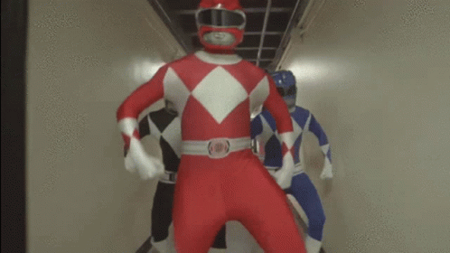 Red Power Ranger in Hallway With Two Others