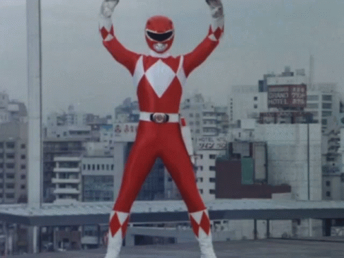 Red Power Ranger Standing in City