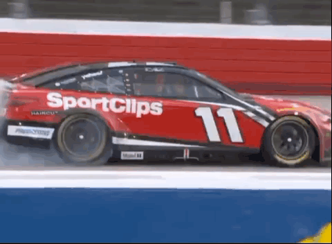 Red Race Car Number 11 Drifting