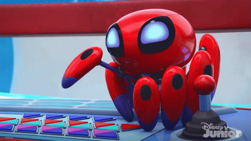 Red Robot Sitting on Disney Junior Display