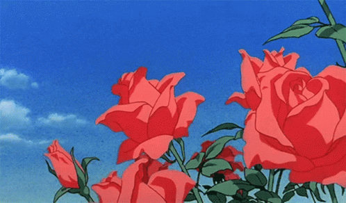 Red Roses Against Blue Sky With Clouds