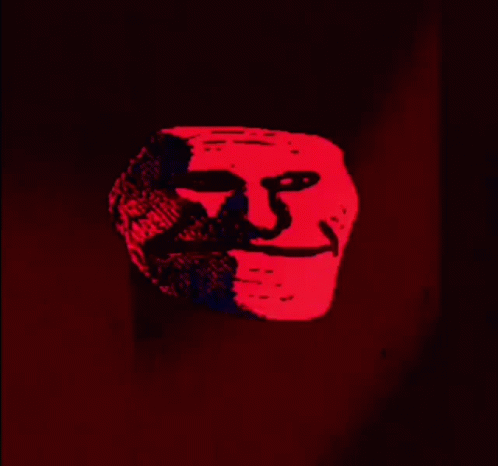 Red Scary Troll Meme Face Approaching GIF