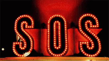 Red SOS Sign Lit Up