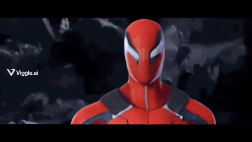 Red Spiderman Standing in Front of Fence