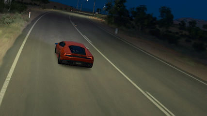 Red Sports Car at Night with A Plate