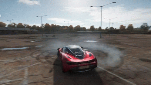 Red Sports Car Drifting on Dirt Road