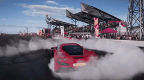 Red Sports Car Drifting on Track