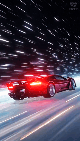 Red Sports Car Driving at Night