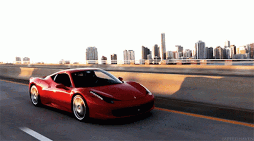 Red Sports Car Driving City Highway