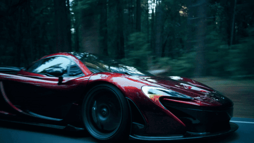 Red Sports Car Driving with Baklaren