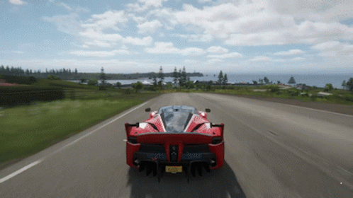 Red Sports Car Driving with New York License Plate