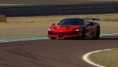 Red Sports Car on Race Track