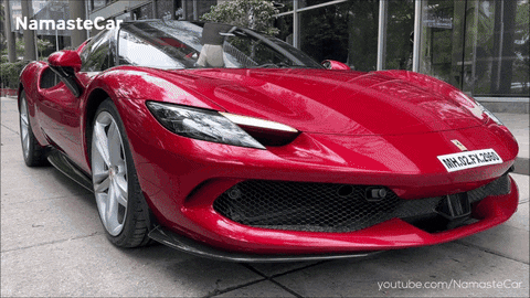 Red Sports Car with License Plate NM10EY