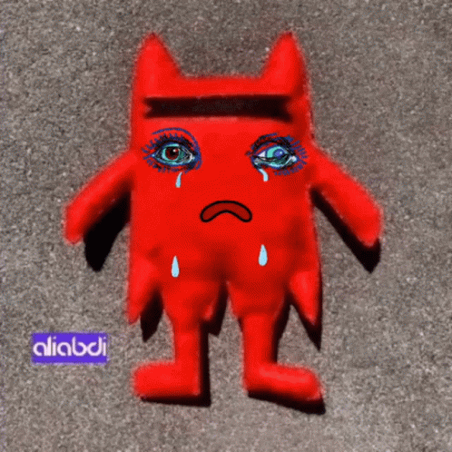 Red Stuffed Animal Crying with Purple Label Aliabdi