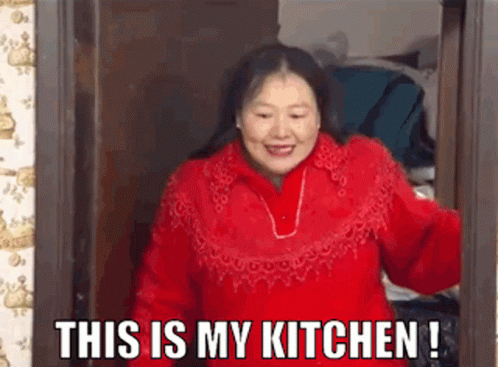 Red Sweater Woman Says This Is My Kitchen GIF