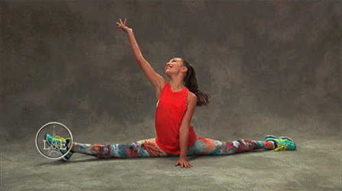 Red Tank Top Girl Doing Split Arms Up GIF