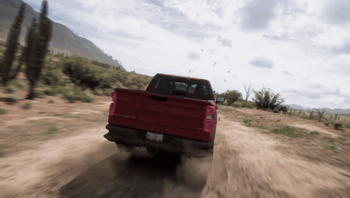 Red Truck Driving On Dirt Road GIF