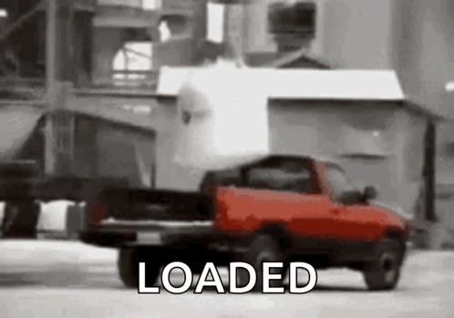 Red Truck On Snowy Road Building Saying Loaded GIF