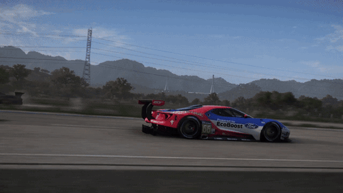 Red White and Blue Ford EcoBoost Race Car on Track