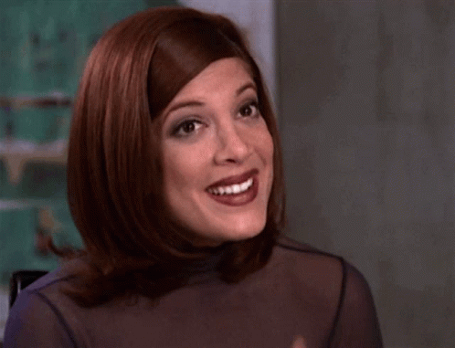 Redhaired Woman Smiling Wearing Ring GIF