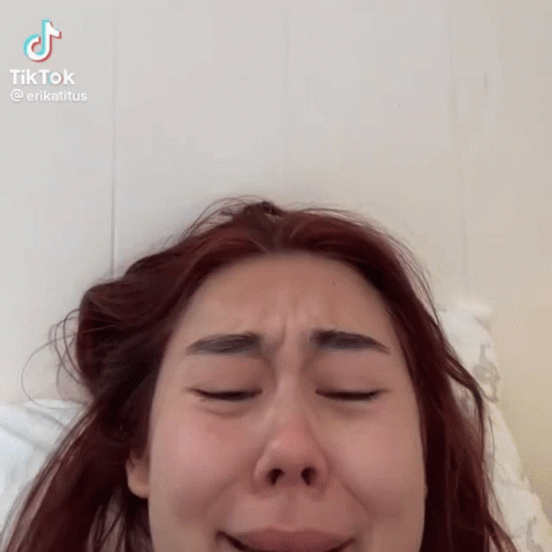 Redhead Laying On Bed Eyes Closed GIF
