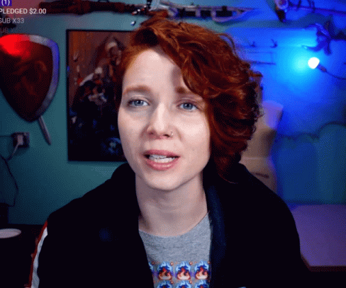 Redhead Looking at Camera Pledge $2.00