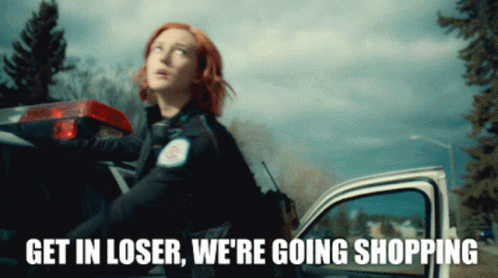 Redhead Standing Next To Police Car Saying Get In Loser We're Going Shopping