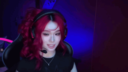 Redhead Woman in Headphones with Microphone Saying GG Fucking