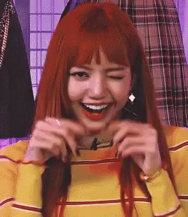 Redhead Woman In Yellow Striped Sweater Making Funny Face GIF