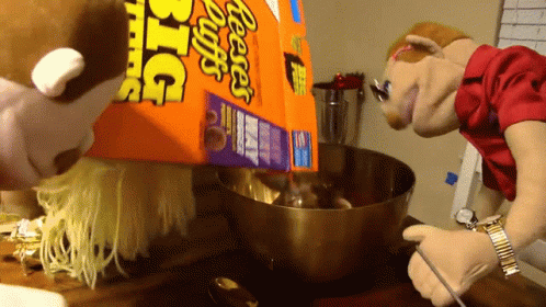 Reese's Puffs Poured Into Mixing Bowl