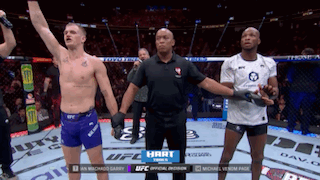 Referee Between Two UFC Fighters GIF