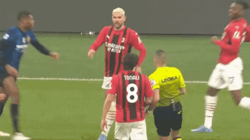 Referee Giving Red Card to Player 23