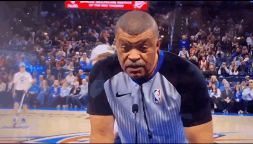 Referee in Nike Shirt on Basketball Court
