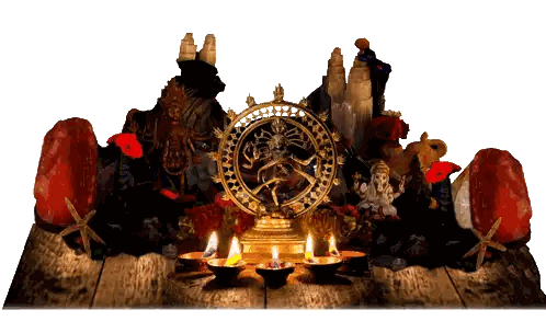 Religious Statue Surrounded by Candles