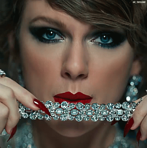 Reputation Taylor Eating Jewelry GIF