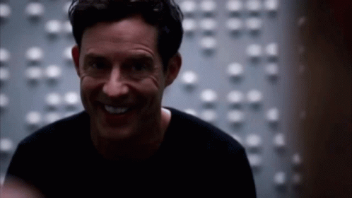 Reverse Flash Tom Cavanagh Evil Smile GIF