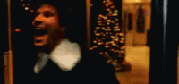 Revolving Door Elf Movie Will Ferrell GIF